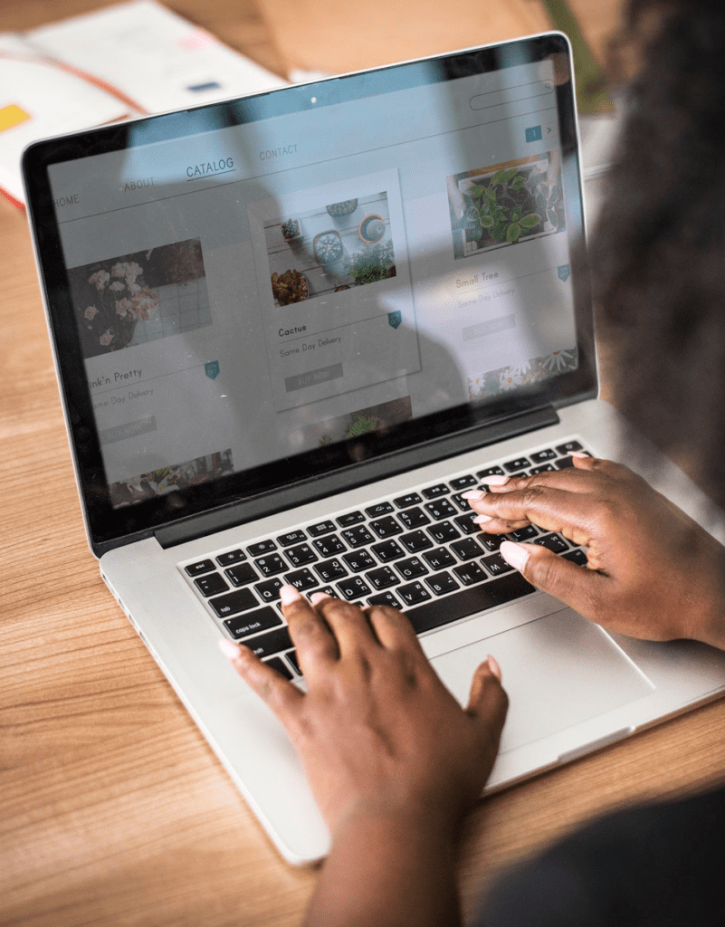 woman using a macbook pro